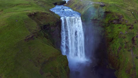 Famous-Skogafoss-Waterfall-At-Skogar-Village,-South-Iceland---aerial-shot