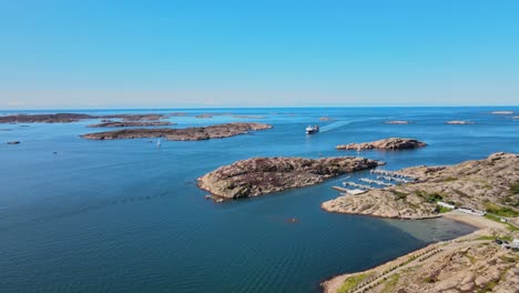 Aerial-View-Of-Pinnevik-Beach-Near-Marina-With-Seascape-In-Lysekil,-Sweden
