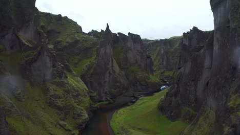 Green-Fjaðrárgljúfur-Canyon,-near-Kirkjubæjarklaustur-village,-South-Coast-of-Iceland---aerial-drone-shot