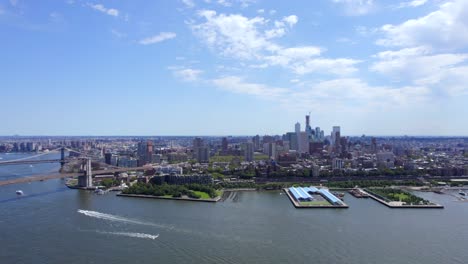 September-2021---4K-aerial-of-Brooklyn-from-the-East-River,-NYC,-USA