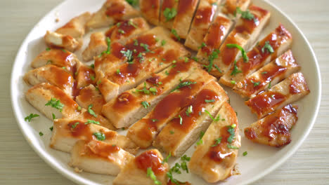 grilled-honey-chicken-breast-sliced-on-white-plate
