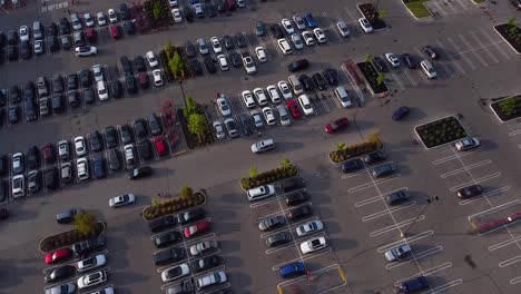 Busy-parking-lot-with-cars-and-people-shopping-at-grocery-and-retail-store-during-gasoline-shortage