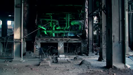Creepy-location-in-abandoned-power-plant-with-green-pipes-and-white-smoke
