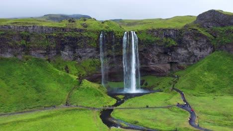 Aerial-View-Of-Seljalandsfoss-Waterfall-In-Iceland-During-Summer---drone-shot