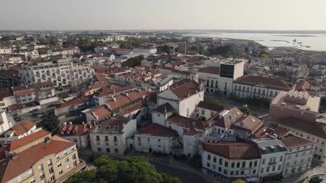 Majestic-cityscape-of-Aveiro-city-in-Portugal,-orbit-drone-view