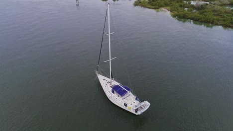 Fly-over-shot-of-sailboat-in-Florida,-United-States