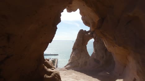 Natural-arch-in-Mexican-rocky-cliff,-La-Paz-coastline-Sea-of-Cortez