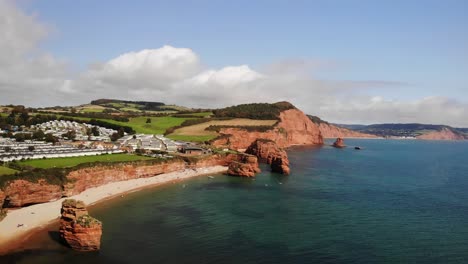 Aerial-Over-Ladram-Bay-Beach-With-Sea-Stacks-In-View