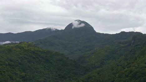 Beautiful-nature-mountain-valley-landscape-view-under-cloudy-sky-in-Puerto-Galera,-Philippines