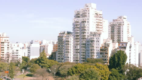 AERIAL---Apartment-buildings-and-skyline-of-Buenos-Aires,-Argentina,-rising-shot