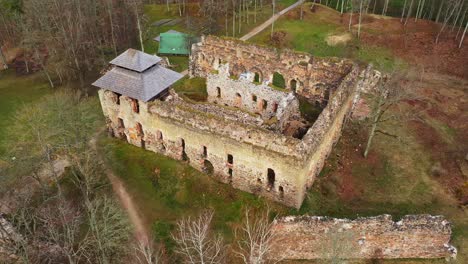 Ruins-of-medieval-castle-in-cinematic-drone-orbit-view