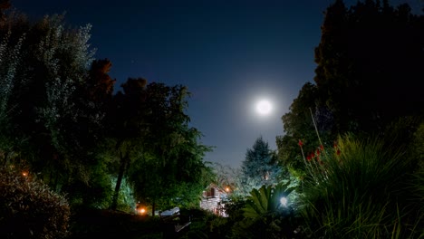 Time-lapse-of-the-full-moon-seen-from-the-garden-of-a-house