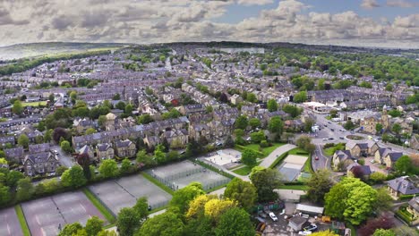 Aerial-drone-shot-rising-over-beautiful-countryside-Yorkshire-town-in-England