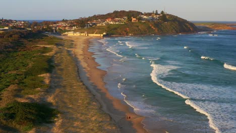 Aerial-view-of-Port-Kembla-Beach-In-Wollongong-at-Sunset---Sydney,-NSW,-Australia