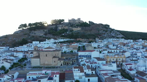 AERIAL---Sunrise-at-the-town-of-Espera,-Cadiz,-Spain,-wide-shot-forward