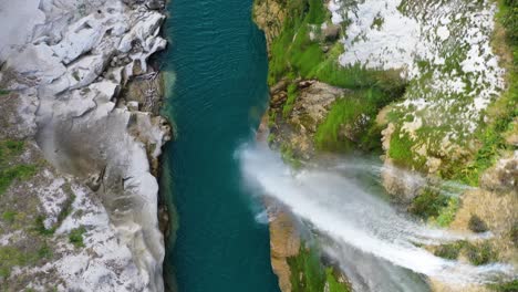 drone-footage-of-Tamul-Waterfall-with-turquoise-water-in-San-Luis-Potosi,-Mexico