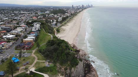 Mick-Shamburg-Park-At-The-Rocky-Cliff-At-Burleigh-Beach-In-Australian-State-Of-Queensland