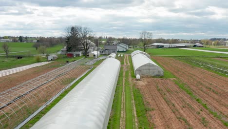 Aerial-of-plastic-covered-greenhouse-for-growing-plants-and-vegetables-in-USA