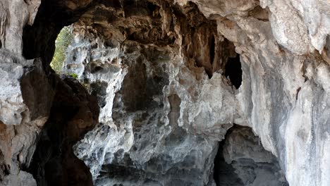 Natural-cave-rock-formation,-Asian-karst-mountain-cave-interior-stalactites