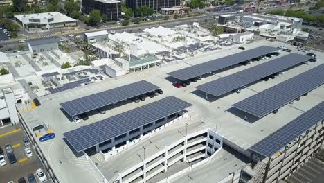 Rising-aerial,-Topanga-Canyon-Mall-solar-panels,-alternative-technology