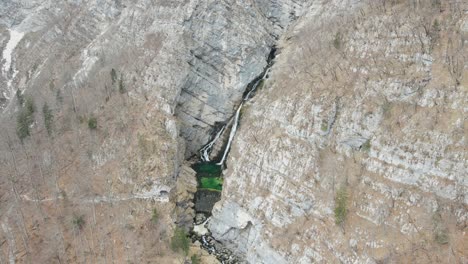 Majestic-Savica-waterfall,-Bohinj,-Slovenia.-Scenic-aerial-pullback