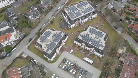 Aerial-of-solar-panels-on-top-of-large-houses