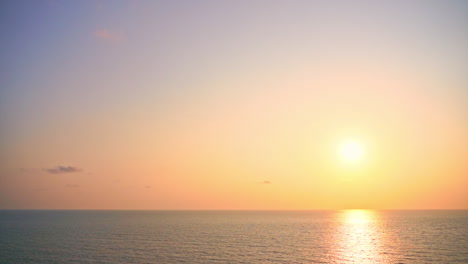 Golden-hour-sunlight-before-sunset-above-calm-caribbean-sea,-tropical-serenity,-static-full-frame