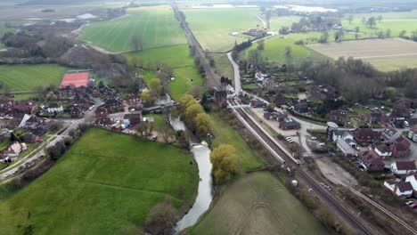 This-is-a-drone-shot-following-the-Stour-river-through-Wye-a-historic-village-in-England
