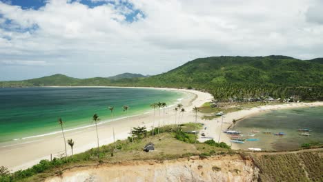 Aerial-reveal-of-Twin-Beach-and-Nacpan-Beach,-El-Nido,-Palawan,-Philippines