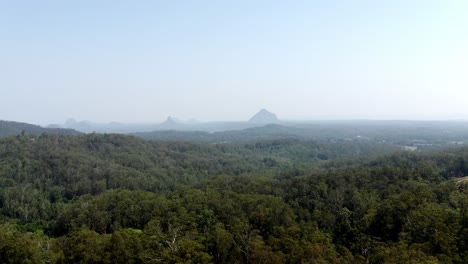 Distant-View-Of-Glass-House-Mountains-And-Green-Forest-In-South-East-Queensland,-Australia