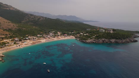 Mediterranean-sea-side-in-Albania,-vacation-resorts-and-villas-near-beautiful-beaches