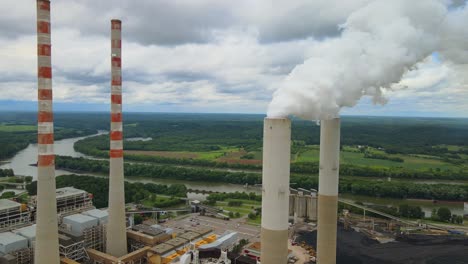 Aerial-orbit-of-smokestacks-at-a-fossil-plant-in-Cumberland-City,-Tennessee