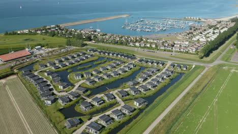 Bird's-Eye-View-Of-Roompot-Water-Village-And-Marina-By-The-Shore-In-Kamperland,-Zeeland,-Netherlands