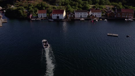 Drone-shot-of-boat-driving-inbetween-2-islands-4k