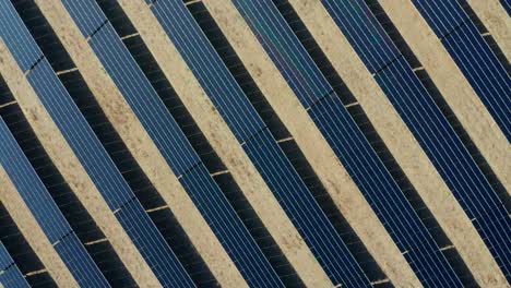 Bird's-eye-shot-of-blue-solar-panel-cell-group-in-the-outdoors
