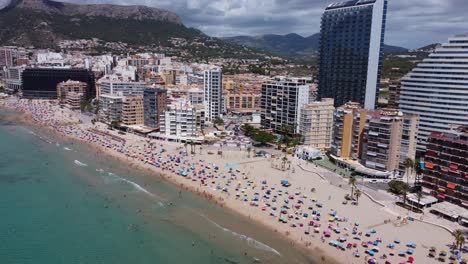 Wide-shot-of-tourism-industry-at-Calpe-beach-Spain,-Europe