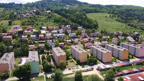 Aerial-shot-of-residential-area-with-few-blocks-of-flats,-stunning-views-and-single-family-houses