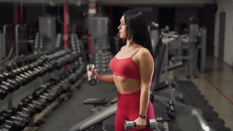 girl-with-dumbbells-exercises-over-biceps