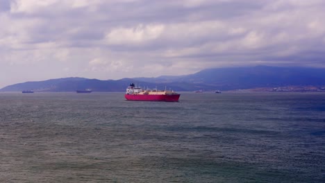 Wide-shot-of-bay-of-Gibraltar-with-cargo-ships-on-the-sea