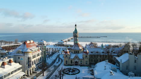 Aerial-view-of-beautiful-snowy-city-of-Sopot-during-sunny-day-in-winter
