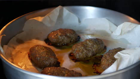 Delicious-meatballs-on-a-baking-sheet-are-baked-in-the-oven