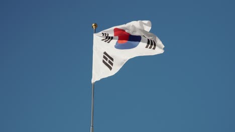 Republic-of-South-Korean-flag-waves-on-sky-background-on-a-flagpole