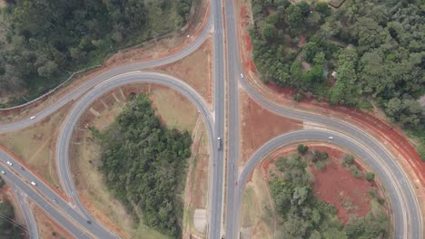 Top-view-tracking-shot-of-truck-driving-on-Nairobi-Southern-Bypass-Highway-Kenya