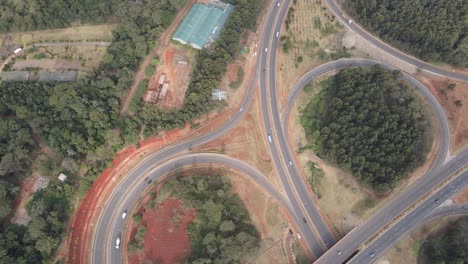Directly-above-view-of-loop-ramp-of-Nairobi-Southern-Bypass-intersection,-Kenya