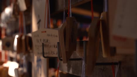 Beautiful-mysterious-wooden-wishing-cards-at-typical-Japanese-shrine-close-up