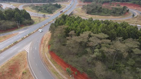 Highway-exit-on-cloverleaf-interchange-on-Nairobi-Bypass-Kenya,-aerial