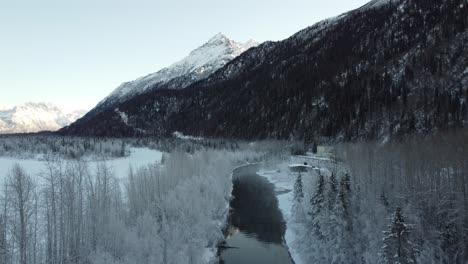 4k-Aerial-footage-of-the-Eklutna-Tailrace,-Palmer,-Alaska,-Winter-2021