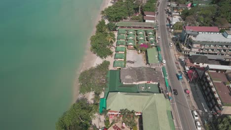 Aerial-view-hotels,-resorts-and-road-in-Koh-Chang-Island-in-Thailand