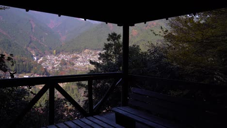 View-up-from-silhouette-viewpoint-towards-mountain-forest-village