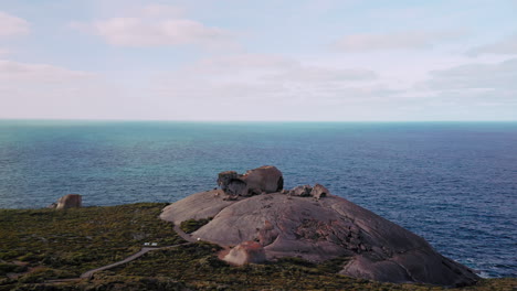 Aerial-view-panning-towards-the-Remarkable-Rocks-,-in-Flinders-Chase,-Kangaroo-Island,-Australia---orbit,-drone-shot